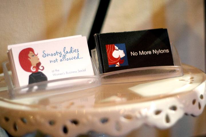 Business cards on a stand by Jodi Womack